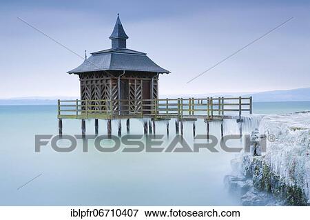 Stock Photo - Iced bathhouse, Lake Neuchâtel, Gorgier, Neuchâtel, Switzerland, Europe. Fotosearch
