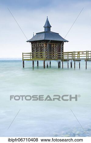 Stock Photo - Iced bathhouse, Lake Neuchâtel, Gorgier, Neuchâtel, Switzerland, Europe. Fotosearch