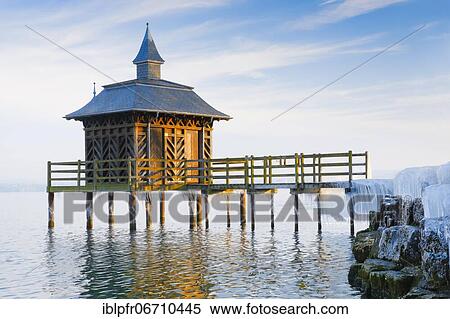 Stock Photography - Iced bathhouse, Lake Neuchâtel, Gorgier, Neuchâtel, Switzerland, Europe. Fotosearch