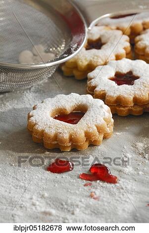 Stock Photo - Icing sugar, rogue biscuits, cookies, biscuits, cookies, Christmas cookies, baking, sugar. Fotosearch