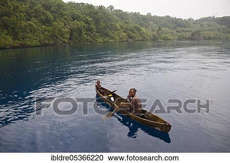 Indigenous people in monoboat, Russell Islands, Solomon Islands, Oceania View Large Photo Image Stock Image - Indigenous people in monoboat, Russell Islands, Solomon Islands, Oceania. Fotosearch