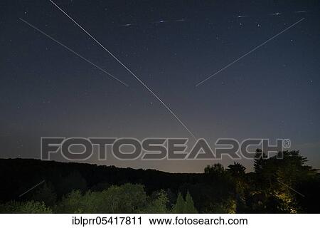 Iridium Flare, unknown satellite, ISS, 30. 07. 2018, 23. 09 h, Münden nature park Park, Münden, Lower Saxony, Germany, Europe View Large Photo Image Stock Image - Iridium Flare, unknown satellite, ISS, 30. 07. 2018, 23. 09 h, Münden nature park Park, Münden, Lower Saxony, Germany, Europe. Fotosearch