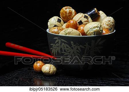 Stock Photograph - Japanese rice crackers with seaweed, Nomi Gonomi Crackers, nibbles. Fotosearch