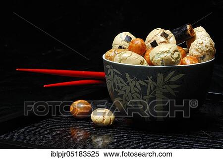 Japanese rice crackers with seaweed, Nomi Gonomi Crackers, nibbles View Large Photo Image Stock Photography - Japanese rice crackers with seaweed, Nomi Gonomi Crackers, nibbles. Fotosearch