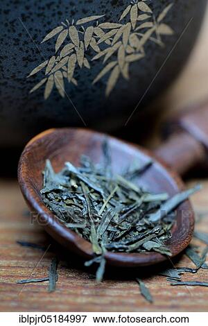 Japanese Sencha tea in wooden spoon View Large Photo Image Stock Photo - Japanese Sencha tea in wooden spoon. Fotosearch