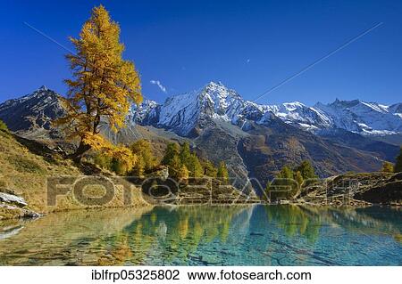 Stock Image - Lac Bleu, Grande Dent de Veisivi, Dent de Perroc, Aiguille de la Tsa, Valais, Switzerland, Europe. Fotosearch