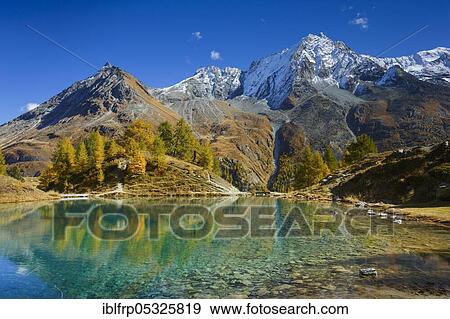 Stock Photo - Lac Bleu, Grande Dent de Veisivi, Dent de Perroc, Valais, Switzerland, Europe. Fotosearch