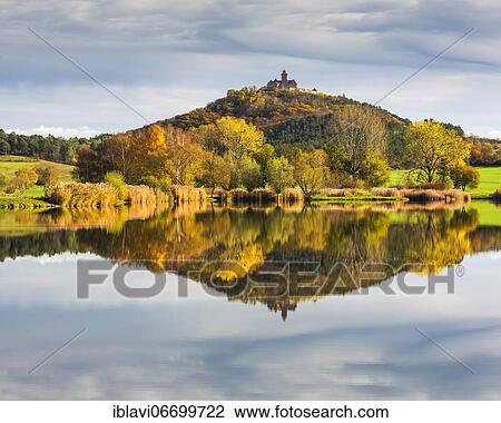 Landscape with lake in autumn, Veste Wachsenburg reflected, castle of the castle ensemble Drei Gleichen, Mühlberg, Thuringia, Germany, Europe View Large Photo Image Stock Image - Landscape with lake in autumn, Veste Wachsenburg reflected, castle of the castle ensemble Drei Gleichen, Mühlberg, Thuringia, Germany, Europe. Fotosearch