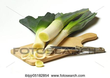 Picture - Leek, leek, sliced, knife, chopping board, wooden board. Fotosearch
