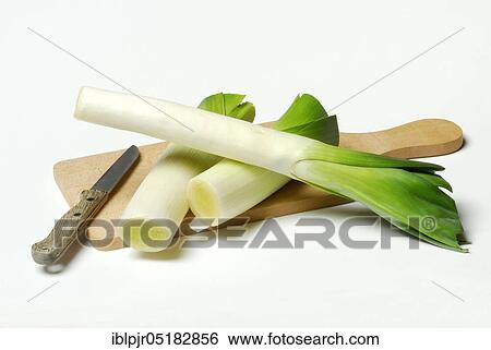 Stock Photograph - Leek, leek, sliced, knife, chopping board, wooden board. Fotosearch