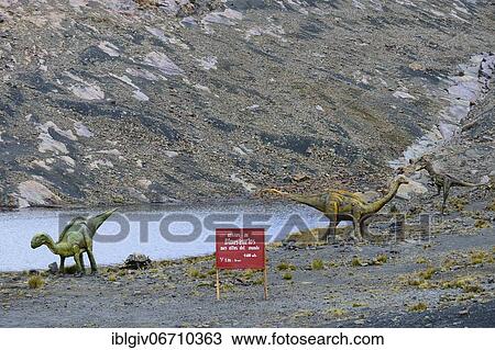 Stock Image - Life-size figures of dinosaurs at the highest site in the world, Pastoruri Glacier, Cordillera Blanca, Recuay Province, Peru, South America. Fotosearch