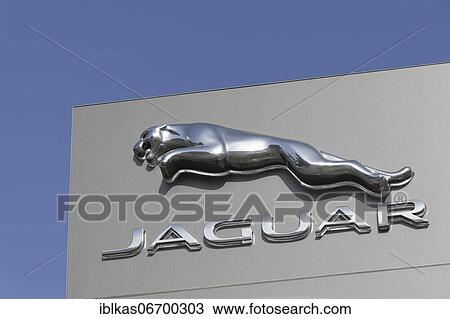 Stock Image - Logo of the car brand Jaguar on a pillar, car dealership, Düsseldorf, North Rhine-Westphalia, Germany, Europe. Fotosearch