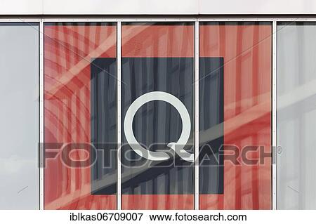 Stock Photo - Logo QVC at the German headquarters, teleshopping channel, e-commerce company, Düsseldorf Media Harbour, Düsseldorf, North Rhine-Westphalia. Fotosearch