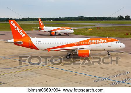 Luton (LTN), July 8, 2019: An EasyJet Airbus A320 with registration G-EZWD at London Luton Airport in the United Kingdom, United Kingdom, Europe View Large Photo Image Picture - Luton (LTN), July 8, 2019: An EasyJet Airbus A320 with registration G-EZWD at London Luton Airport in the United Kingdom, United Kingdom, Europe. Fotosearch