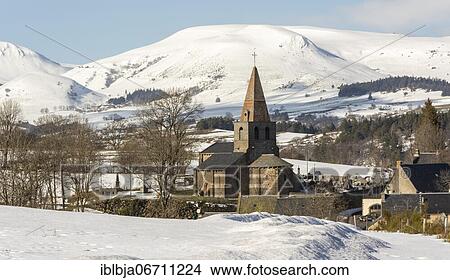 Picture - Massif of Sancy and Saint-victor la Riviere village in Regional natural park of the volcanoes of Auvergne in winter, Puy de Dome. Auvergne-Rhone-Alpes, France, Europe. Fotosearch