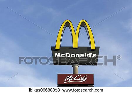McDonald's, McCafe, logos in front of blue sky, Düsseldorf, North Rhine-Westphalia, Germany, Europe View Large Photo Image Stock Photo - McDonald's, McCafe, logos in front of blue sky, Düsseldorf, North Rhine-Westphalia, Germany, Europe. Fotosearch