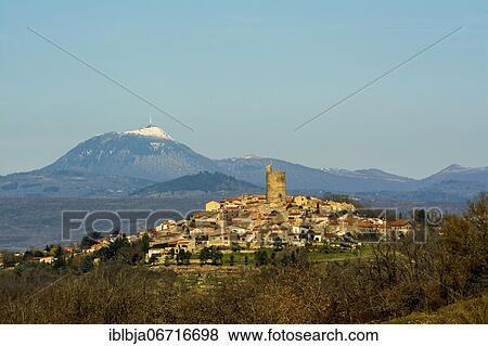 Montpeyroux village, labelled The Most Beautiful Villages of France, with volcano Puy de Dome in background, Auvergne-Rhone-Alpes, France, Europe View Large Photo Image Stock Photo - Montpeyroux village, labelled The Most Beautiful Villages of France, with volcano Puy de Dome in background, Auvergne-Rhone-Alpes, France, Europe. Fotosearch