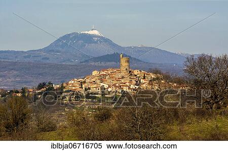 Montpeyroux village, labelled The Most Beautiful Villages of France, with volcano Puy de Dome in background, Auvergne-Rhone-Alpes, France, Europe View Large Photo Image Stock Photography - Montpeyroux village, labelled The Most Beautiful Villages of France, with volcano Puy de Dome in background, Auvergne-Rhone-Alpes, France, Europe. Fotosearch