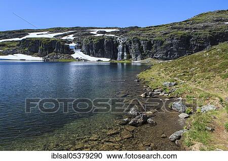 Stock Image - Mountain lake in Bjorgavegen highlands, Vedahaugane, Norway, Europe. Fotosearch