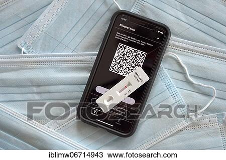 Negative antigen rapid test, test cassette, lies on smartphone with Luca app, surgical masks, Corona crisis, Germany, Europe View Large Photo Image Stock Image - Negative antigen rapid test, test cassette, lies on smartphone with Luca app, surgical masks, Corona crisis, Germany, Europe. Fotosearch