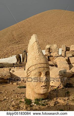 Picture - Nemrut Dagi, Anatolia, Adiyaman Province, Kahta, Nemrud, stone head at the burial mound of King Antiochus, burial shrine, western terrace, stone head, Turkey, Asia. Fotosearch