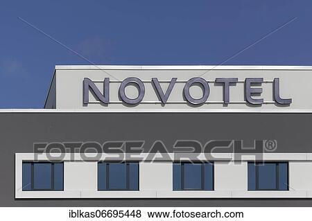 Stock Photo - Novotel Düsseldorf Airport, logo on building, mid-range hotel, Düsseldorf, North Rhine-Westphalia, Germany, Europe. Fotosearch