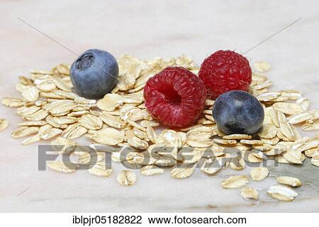 Oat flakes and berries, raspberries, blueberries, oats View Large Photo Image Stock Image - Oat flakes and berries, raspberries, blueberries, oats. Fotosearch