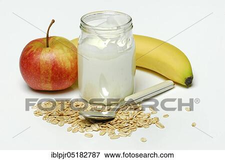 Oat flakes (Avena sativa) Glass of yoghurt, apple, banana, oats, dairy products View Large Photo Image Stock Photo - Oat flakes (Avena sativa) Glass of yoghurt, apple, banana, oats, dairy products. Fotosearch