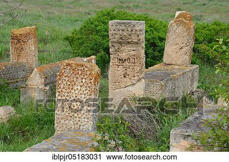 Stock Image - Old cemetery of Gevas, gravesites, gravestones, Seljuks, Seljuk architecture, East Anatolia, Van Province, Lake Van, Ahtamar, Turkey, Asia. Fotosearch