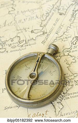 Old compass on map, orientation, discovery, explorer View Large Photo Image Stock Image - Old compass on map, orientation, discovery, explorer. Fotosearch