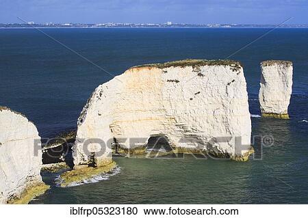 Stock Image - Old Harry Rocks, Swanage Bay, chalk cliff coast, Bournemouth, Jurassic Coast World Heritage Site, Dorset, England, United Kingdom, Europe. Fotosearch