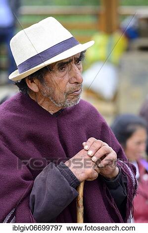 Old indigenous man with hat leaning on a stick, Kuelap, Luya province, Amazonas region, Peru, South America View Large Photo Image Stock Photo - Old indigenous man with hat leaning on a stick, Kuelap, Luya province, Amazonas region, Peru, South America. Fotosearch