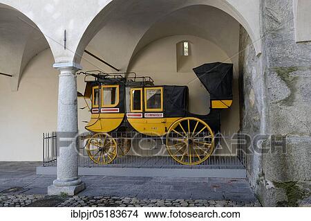 Old stagecoach in the courtyard, Stockalperpalast, Brig, Canton Valais, Switzerland, Europe View Large Photo Image Picture - Old stagecoach in the courtyard, Stockalperpalast, Brig, Canton Valais, Switzerland, Europe. Fotosearch
