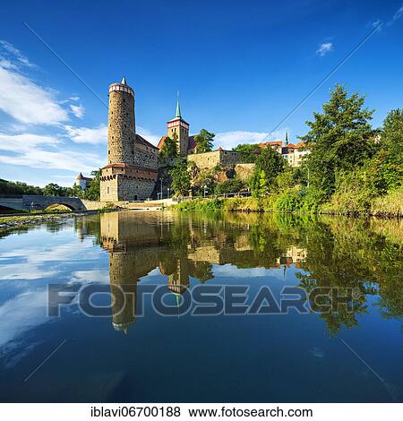 Old water art and St. Michael's church reflected in the water of the Spree, Bautzen, Upper Lusatia, Saxony, Germany, Europe View Large Photo Image Stock Photo - Old water art and St. Michael's church reflected in the water of the Spree, Bautzen, Upper Lusatia, Saxony, Germany, Europe. Fotosearch