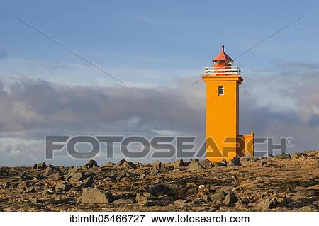Stock Photo - Orange lighthouse Stafnesviti near Stafnes on the peninsula Reykjanes, Iceland, Europe. Fotosearch