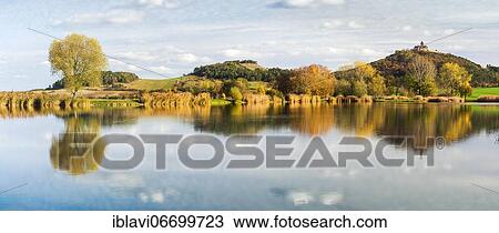 Panorama, landscape with lake in autumn, Veste Wachsenburg reflected, castle of the castle ensemble Drei Gleichen, Mühlberg, Thuringia, Germany, Europe View Large Photo Image Stock Image - Panorama, landscape with lake in autumn, Veste Wachsenburg reflected, castle of the castle ensemble Drei Gleichen, Mühlberg, Thuringia, Germany, Europe. Fotosearch