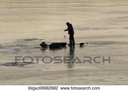 People fishing on frozen river, Province of Quebec, Canada, North America View Large Photo Image Stock Image - People fishing on frozen river, Province of Quebec, Canada, North America. Fotosearch