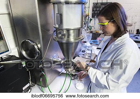 PhD student during her research work on a Hüttlin-Mycrolab machine (fluid bed granulator) at the Institute of Pharmaceutical Technology and Biopharmacy at Heinrich-Heine-University Düsseldorf, North Rhine-Westphalia, Germany, Europe View Large Photo Image Stock Photograph - PhD student during her research work on a Hüttlin-Mycrolab machine (fluid bed granulator) at the Institute of Pharmaceutical Technology and Biopharmacy at Heinrich-Heine-University Düsseldorf, North Rhine-Westphalia, Germany, Europe. Fotosearch
