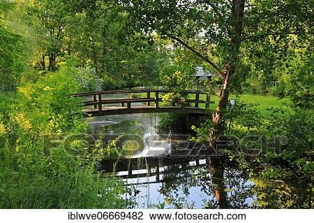 Stock Image - Pond, bridge, monastery garden, Cistercian monastery, Heiligkreuztal, Upper Danube nature park Park, Baden-Württemberg, Germany, Europe. Fotosearch