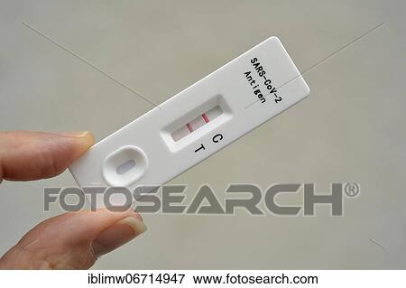 Positive antigen rapid test, test cassette, Corona crisis, Germany, Europe View Large Photo Image Stock Photo - Positive antigen rapid test, test cassette, Corona crisis, Germany, Europe. Fotosearch
