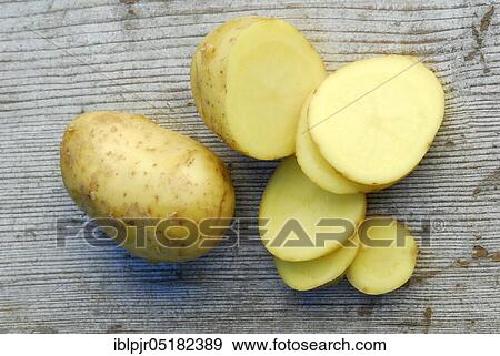 Stock Photo - Potato slices and potatoes, Charlotte variety. Fotosearch