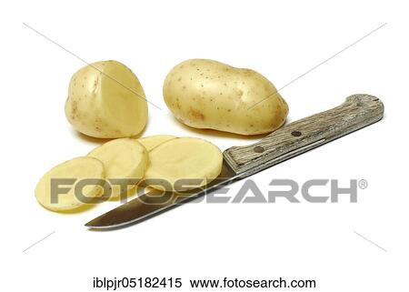 Stock Photography - Potato slices and potatoes, knife. Fotosearch