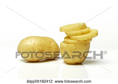 Potato slices and potatoes View Large Photo Image Stock Image - Potato slices and potatoes. Fotosearch
