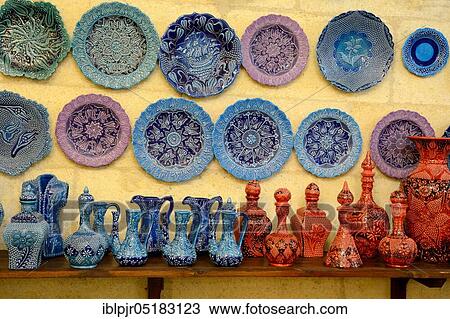 Stock Image - Pottery in pottery, Central Anatolia, Anatolia, crafts, ceramics, pottery handicraft, plate, jug, avanos, Cappadocia, Turkey, Asia. Fotosearch