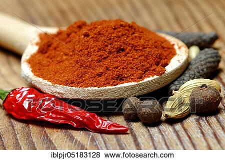 Powder in a wooden spoon (Berbere), spice mixture of chili, pimento, cardamom, pepper, -spice mixture View Large Photo Image Stock Photo - Powder in a wooden spoon (Berbere), spice mixture of chili, pimento, cardamom, pepper, -spice mixture. Fotosearch