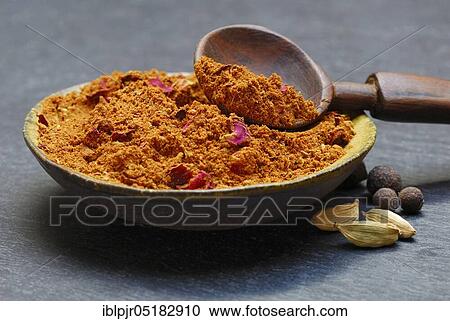 Stock Image - Ras el-Hanout, more than 30 ingredients, spice mixture from Morocco. Fotosearch