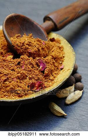 Stock Image - Ras el-Hanout, more than 30 ingredients, spice mixture from Morocco. Fotosearch