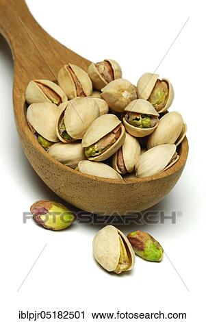 Real Pistachios (Pistacia vera) kernels in wooden spoon View Large Photo Image Stock Image - Real Pistachios (Pistacia vera) kernels in wooden spoon. Fotosearch
