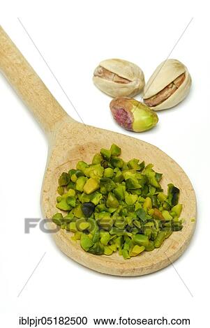 Real Pistachios (Pistacia vera), chopped kernels in wooden spoon View Large Photo Image Stock Image - Real Pistachios (Pistacia vera), chopped kernels in wooden spoon. Fotosearch