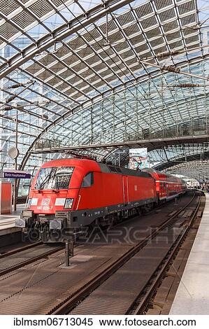 Regional train locomotive train at the station central railway station Hbf in Berlin, Germany, Europe View Large Photo Image Stock Photography - Regional train locomotive train at the station central railway station Hbf in Berlin, Germany, Europe. Fotosearch
